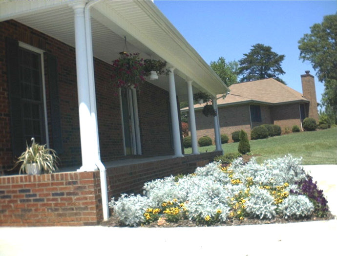 Flowers across the front porch, April 2000