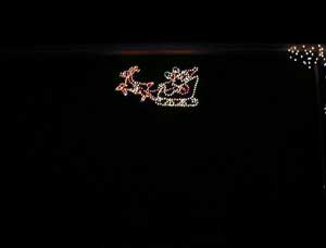 Santa flies on the south wall outside.